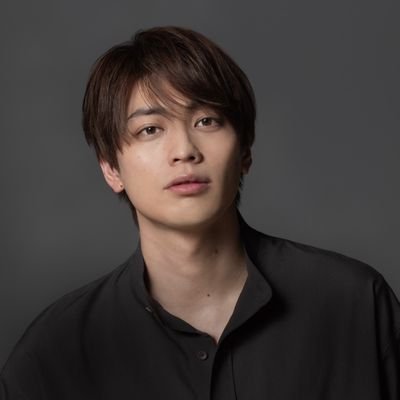 東啓介