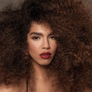 MARIA BOMANI